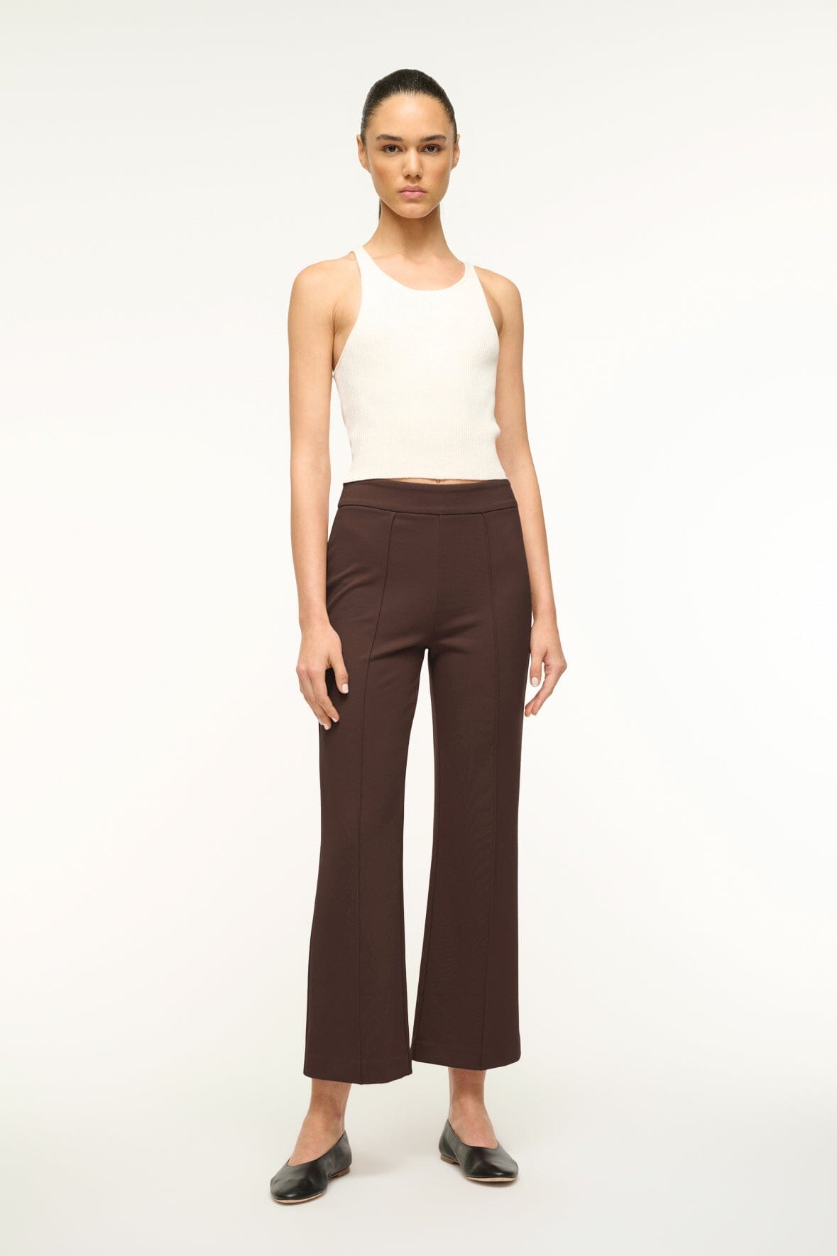 Women's dark chocolate brown wide-leg pants, front view with smooth waistband.