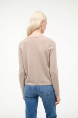 Stone cashmere cardigan back view with button placket
