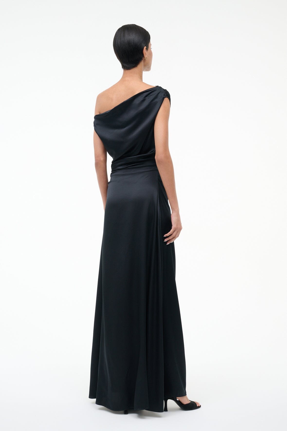 Black silk maxi dress, back view with draped one-shoulder strap and long skirt