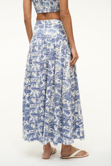 Blue toile maxi skirt with gathered tiers, wide ruffle hem, and elastic waist
