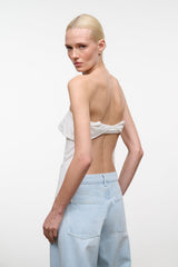 Strapless white top with raw-edged neckline, partial back view