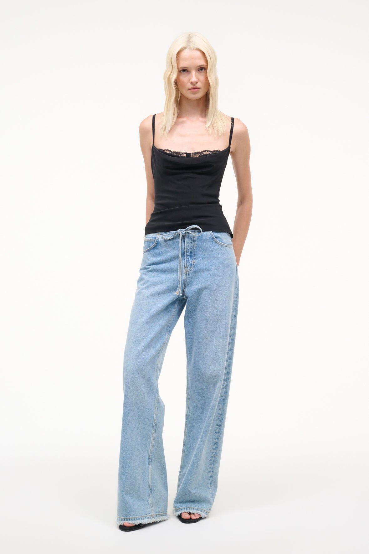 Black silk camisole top with lace-trimmed bust and spaghetti straps, slim fit
