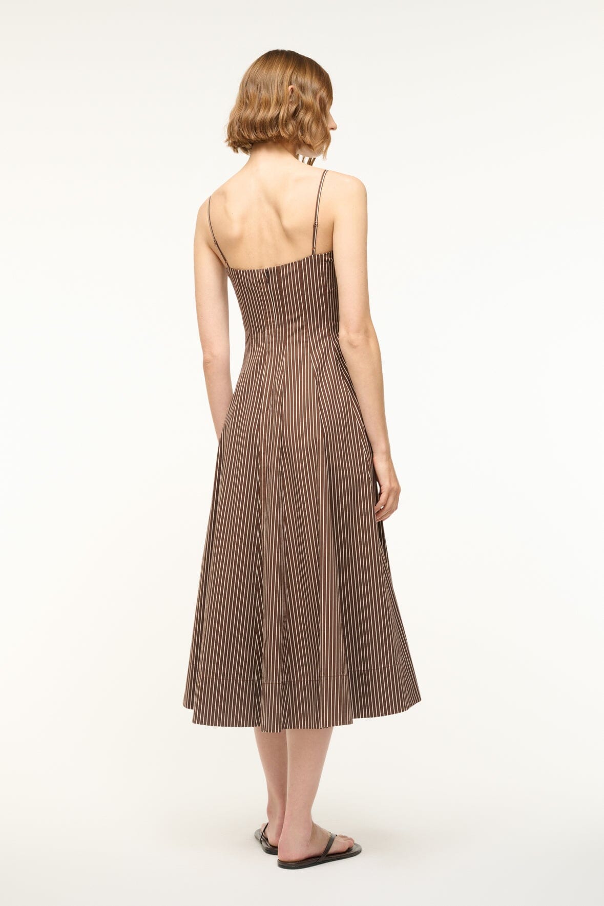 Dark brown micro-striped dress with low back and spaghetti straps