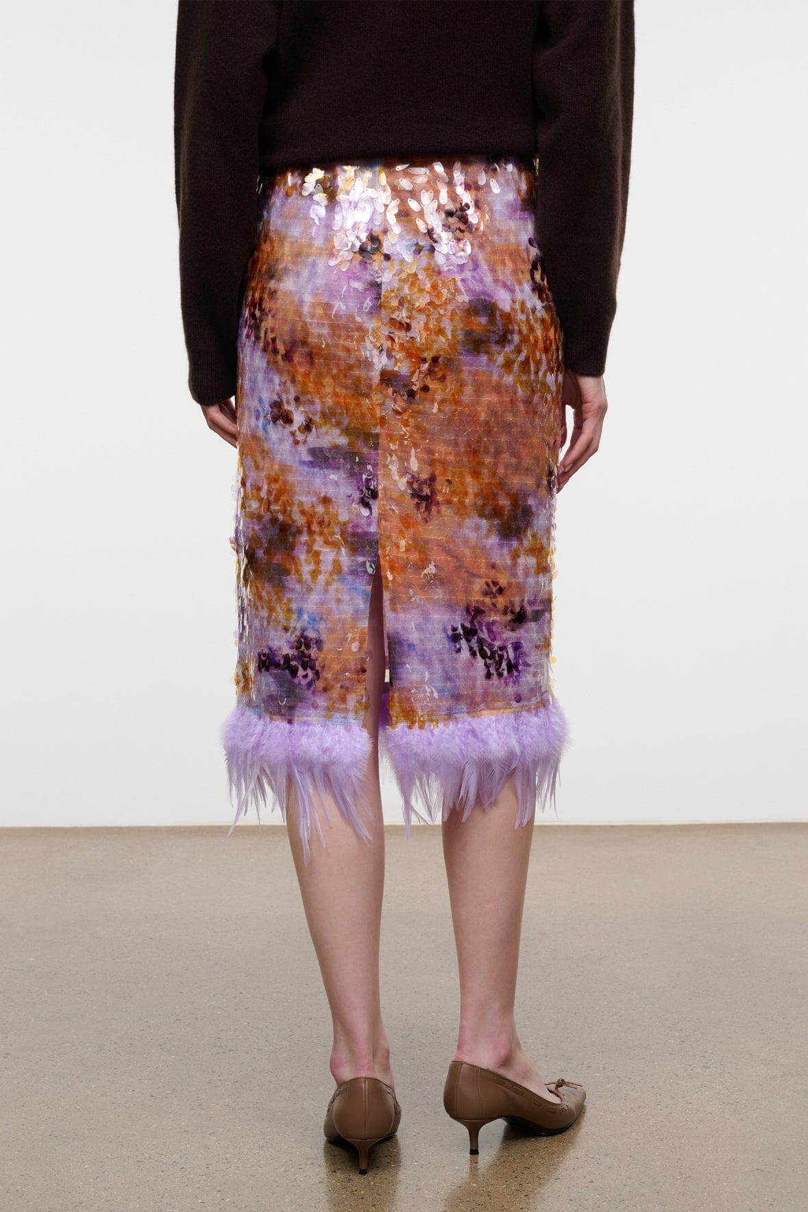 Galaxy print midi pencil skirt with lavender feathered hem, front view