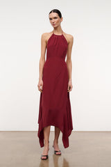 Silk halter dress in dark red with draped asymmetrical hem