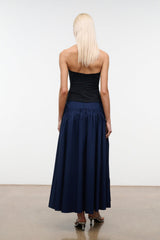 Navy gathered midi skirt with elastic waistband and pleated full skirt