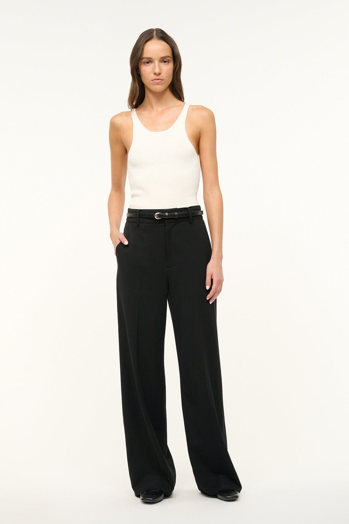 Black slim buckle belt with silver moon buckle on waist
