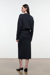 Charcoal sweater dress, midi length, long sleeves, and knotted waist detail
