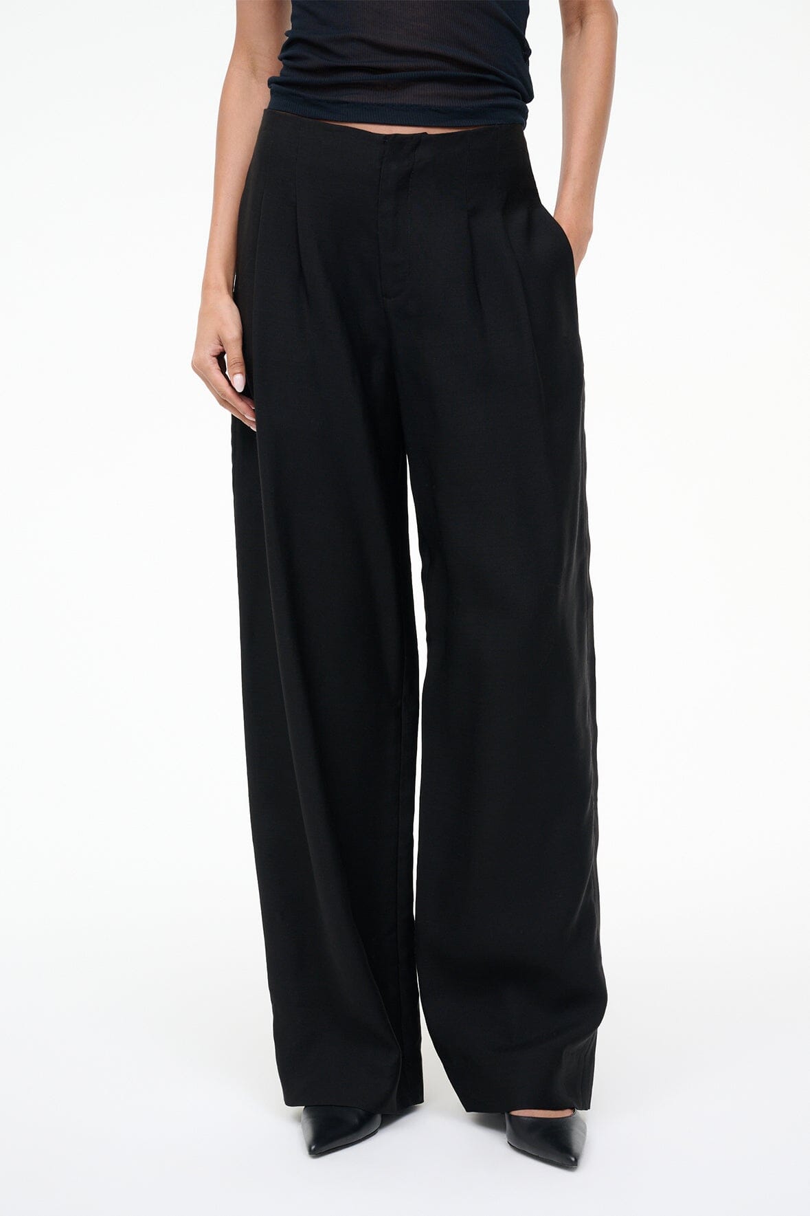 Black wide-leg trousers with draped back and full-length relaxed legs
