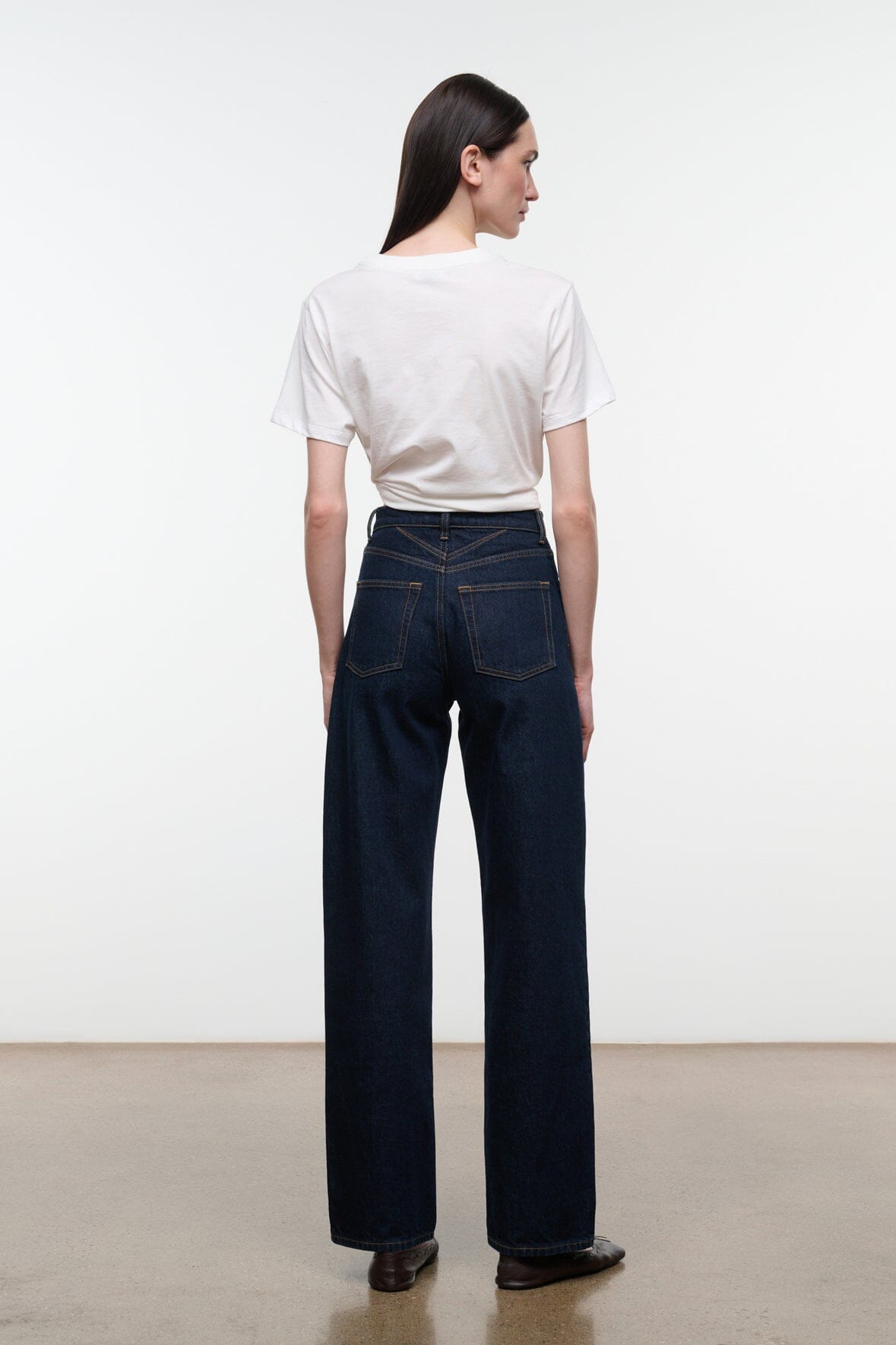 LEO high-rise indigo jeans, back view with belt loops and wide leg