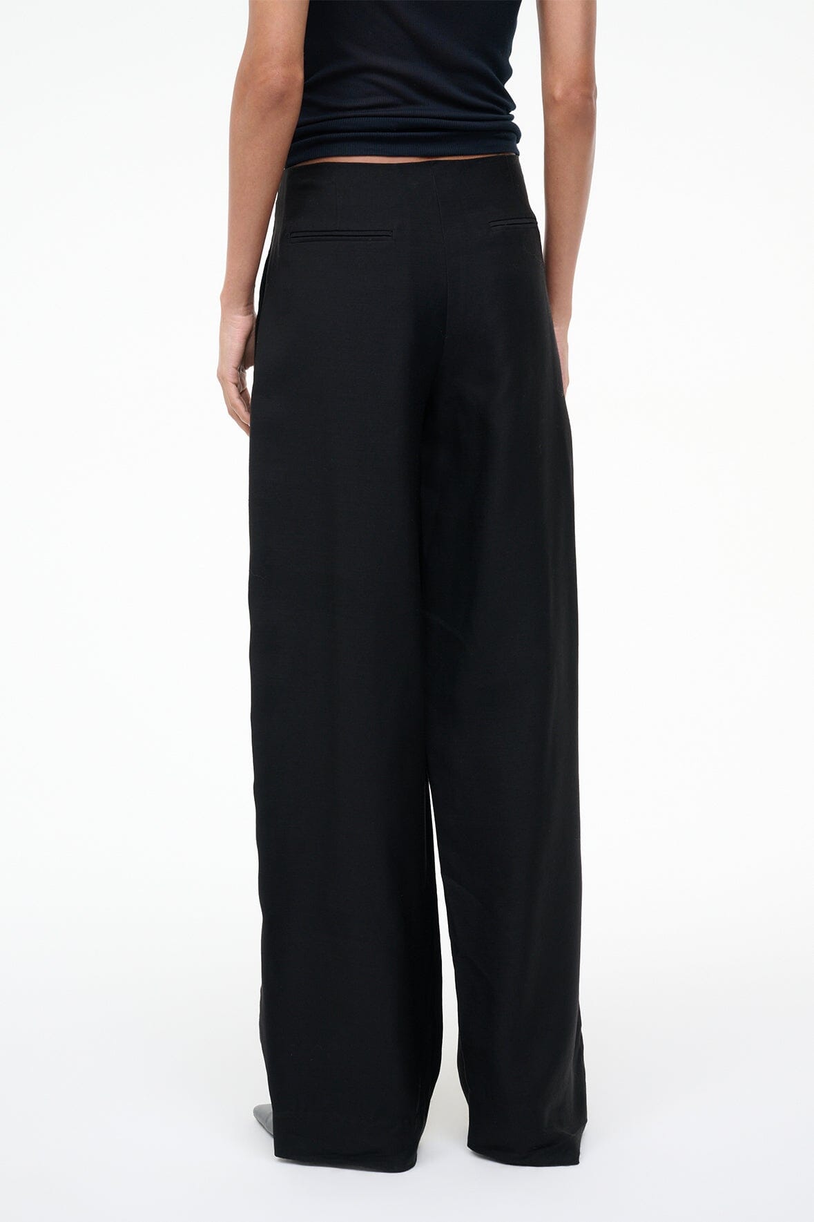 Black wide-leg pants with relaxed fit and long straight legs