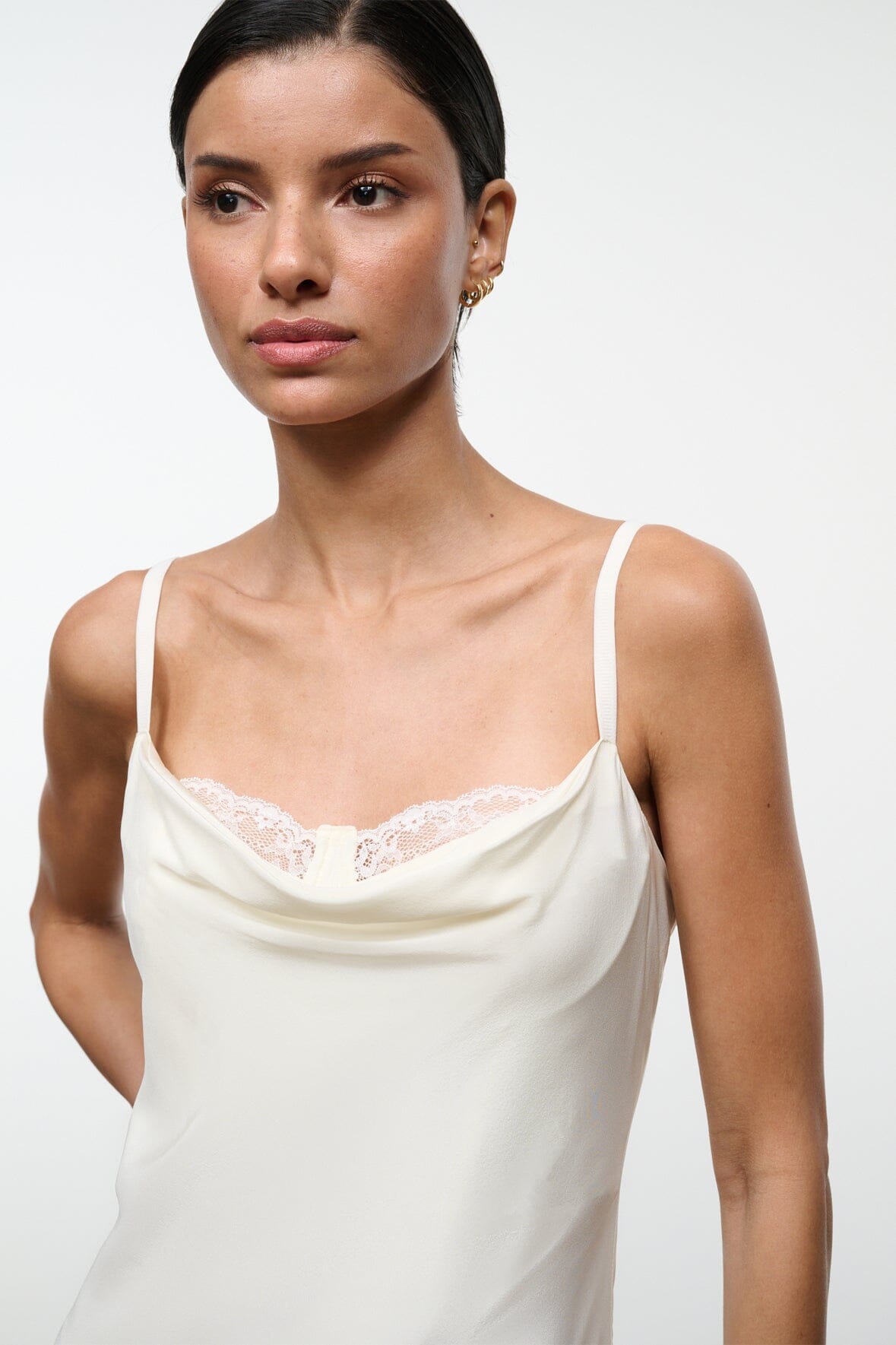 Ivory silk camisole-style midi dress with lace-trim neckline and thin straps