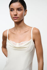 Ivory silk camisole-style midi dress with lace-trim neckline and thin straps
