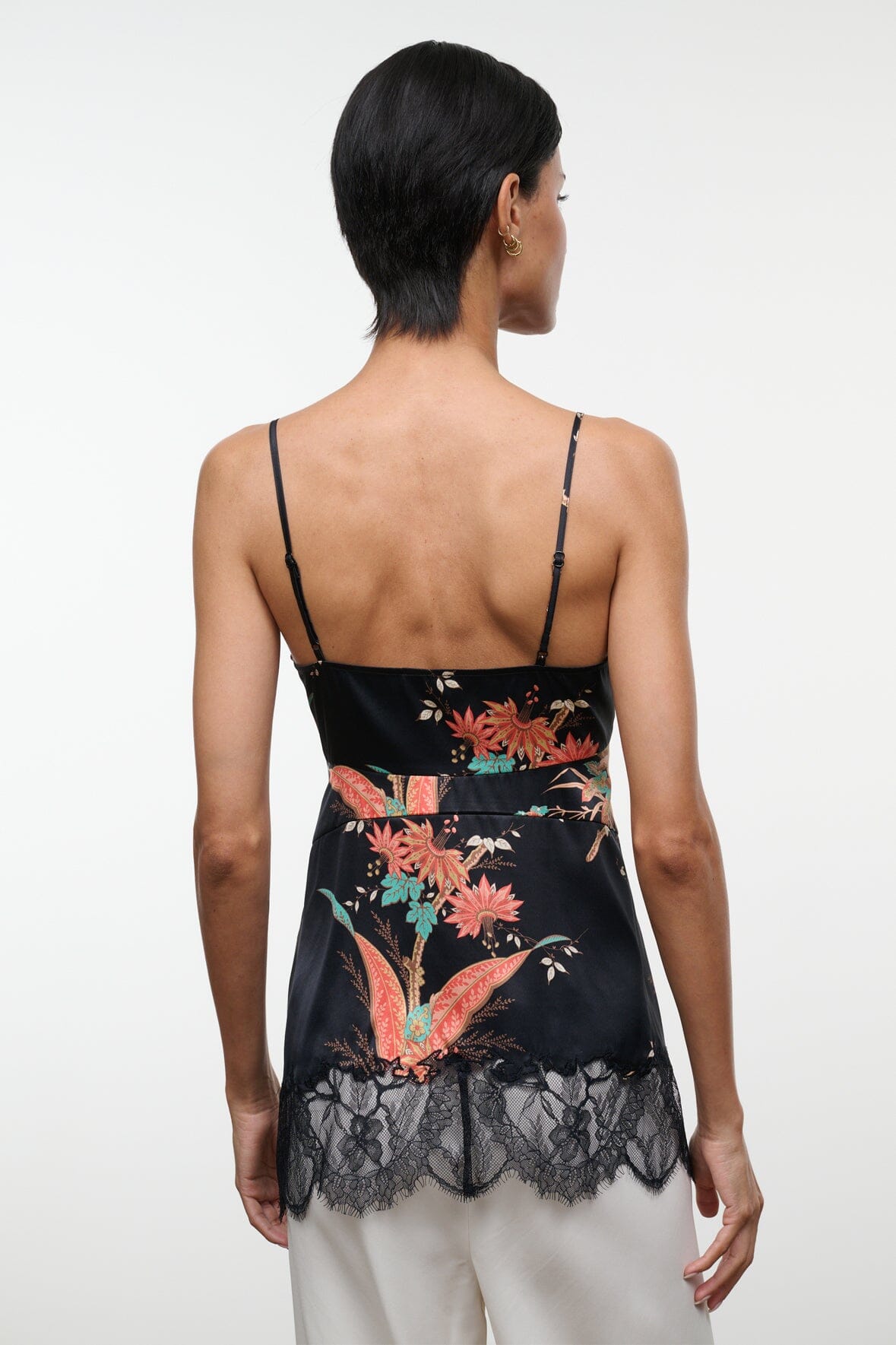 Noir silk camisole top with floral print and lace back hem, adjustable spaghetti straps
