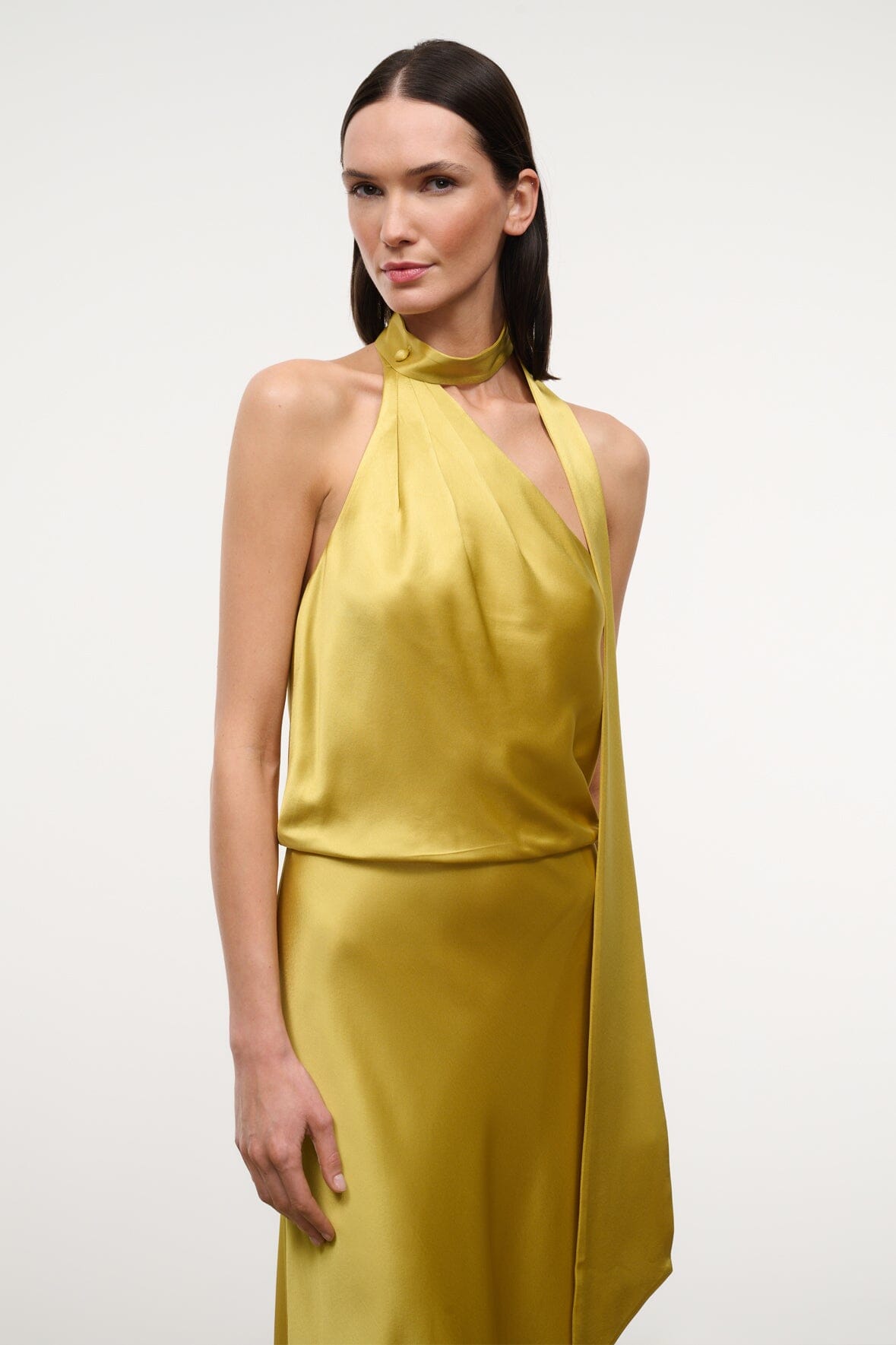 Citron yellow satin halter dress with draped neckline and open-back detail