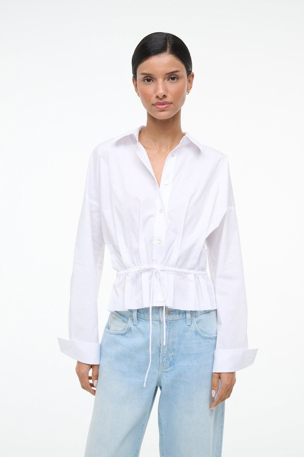 White button-up shirt with collar, long sleeves, drawstring-cinched waist