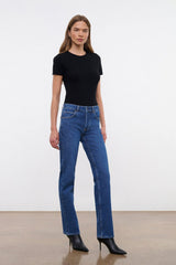 Stone blue straight stretch jeans on model, full length, straight leg