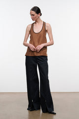 Black wide-leg trousers with front pockets and relaxed straight legs