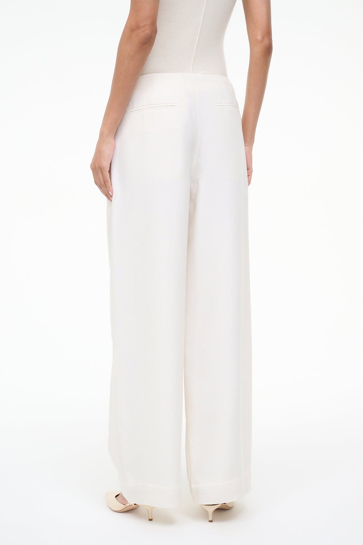 Pierre ivory wide-leg pant close-up of hem and center crease