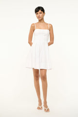 White mini dress with thin spaghetti straps and fitted bust, flared skirt