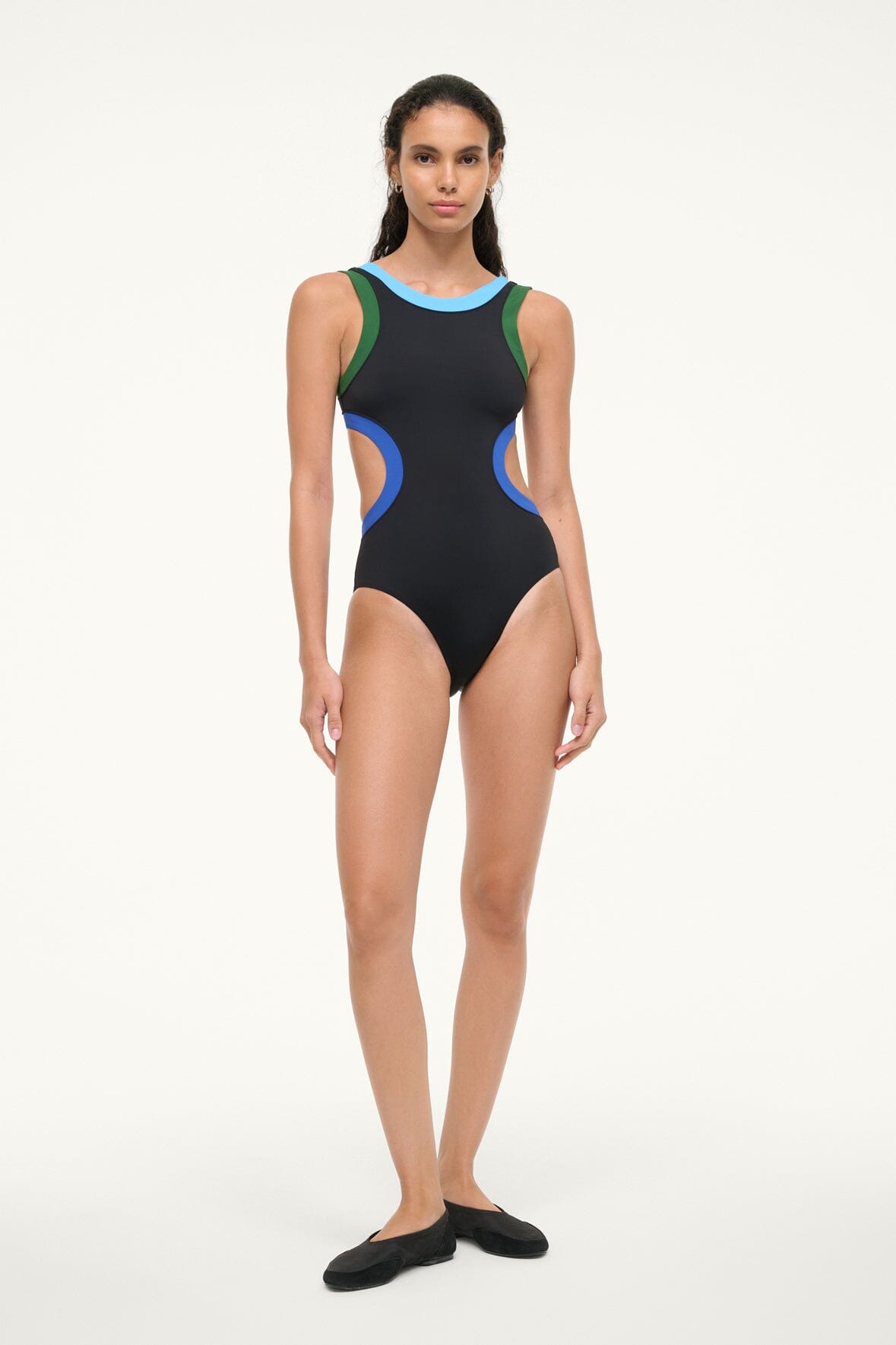 Black one-piece swimsuit with high neck and blue/green side colorblocks.