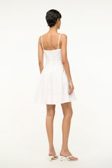 White mini dress, open-back with thin straps and gathered flared skirt