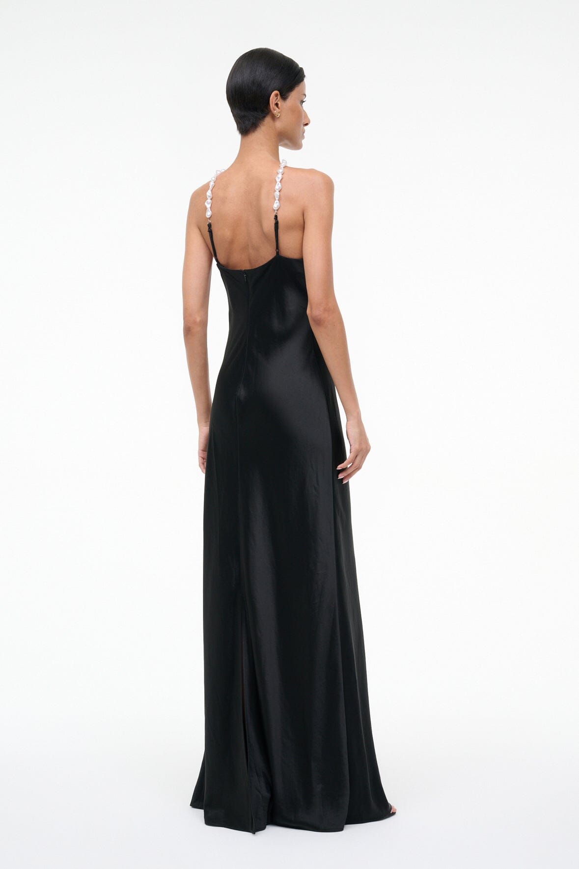 Black halter maxi dress with open back and long chain straps