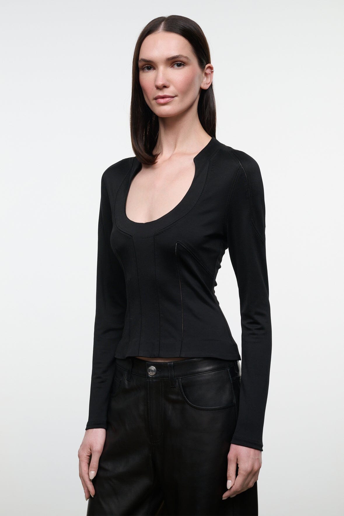 Black fitted long-sleeve scoop-neck top with curved waist seam