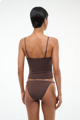 Dark brown tankini top with thin spaghetti straps, ruched front