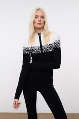 Black snowboard onesie with white fair isle upper yoke and zip-front, long sleeves