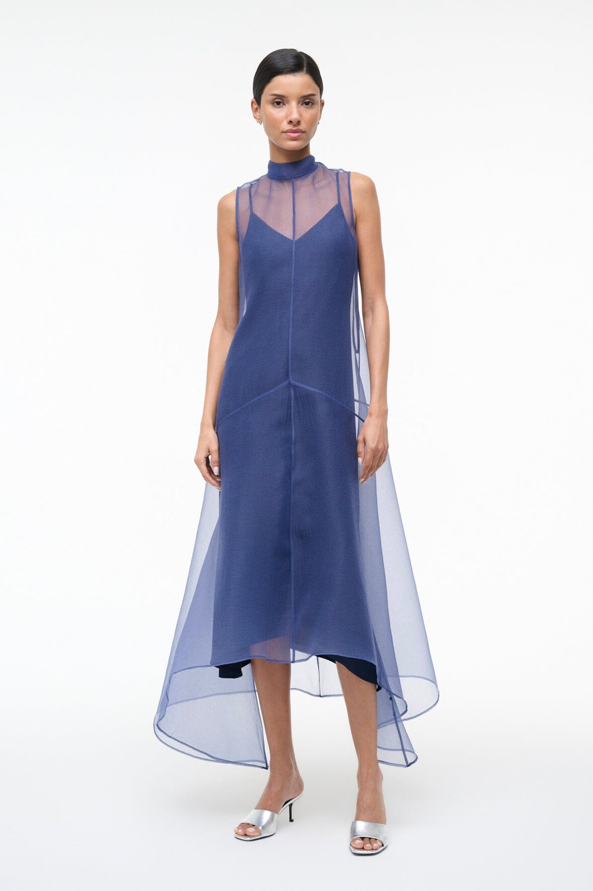 Navy sleeveless high-neck dress with asymmetrical layered chiffon overlay
