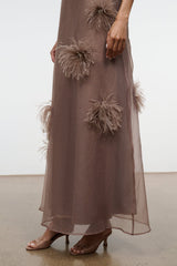 Taupe maxi dress with feather flower appliques along the hem