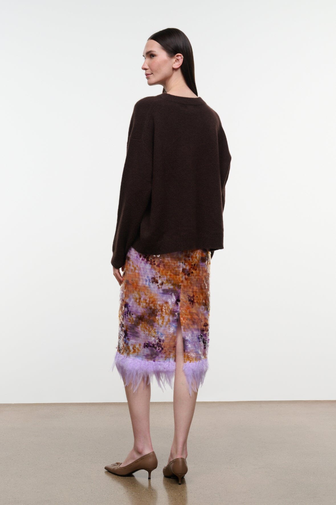 Galaxy print midi pencil skirt with lavender feathered hem, back view