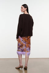 Galaxy print midi pencil skirt with lavender feathered hem, back view