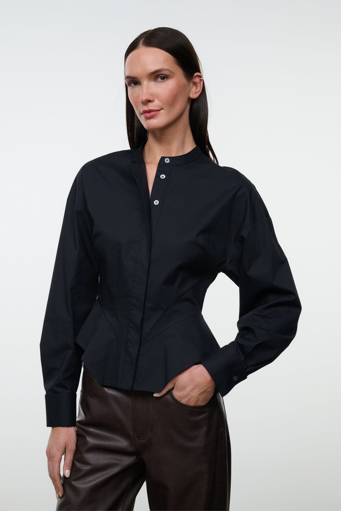 Black button-front top with stand collar and long sleeves, cropped peplum hem