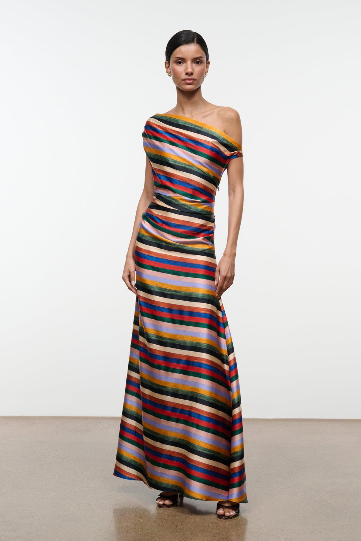Striped silk one-shoulder maxi dress with fitted bodice and flowing skirt