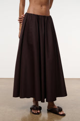 Dark brown midi skirt with elastic gathered waist and wide pleated silhouette
