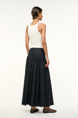 Black midi skirt with gathered waist and full pleated silhouette, back view