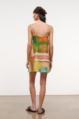 Back view multicolor floral linen mini dress with thin spaghetti straps and open back