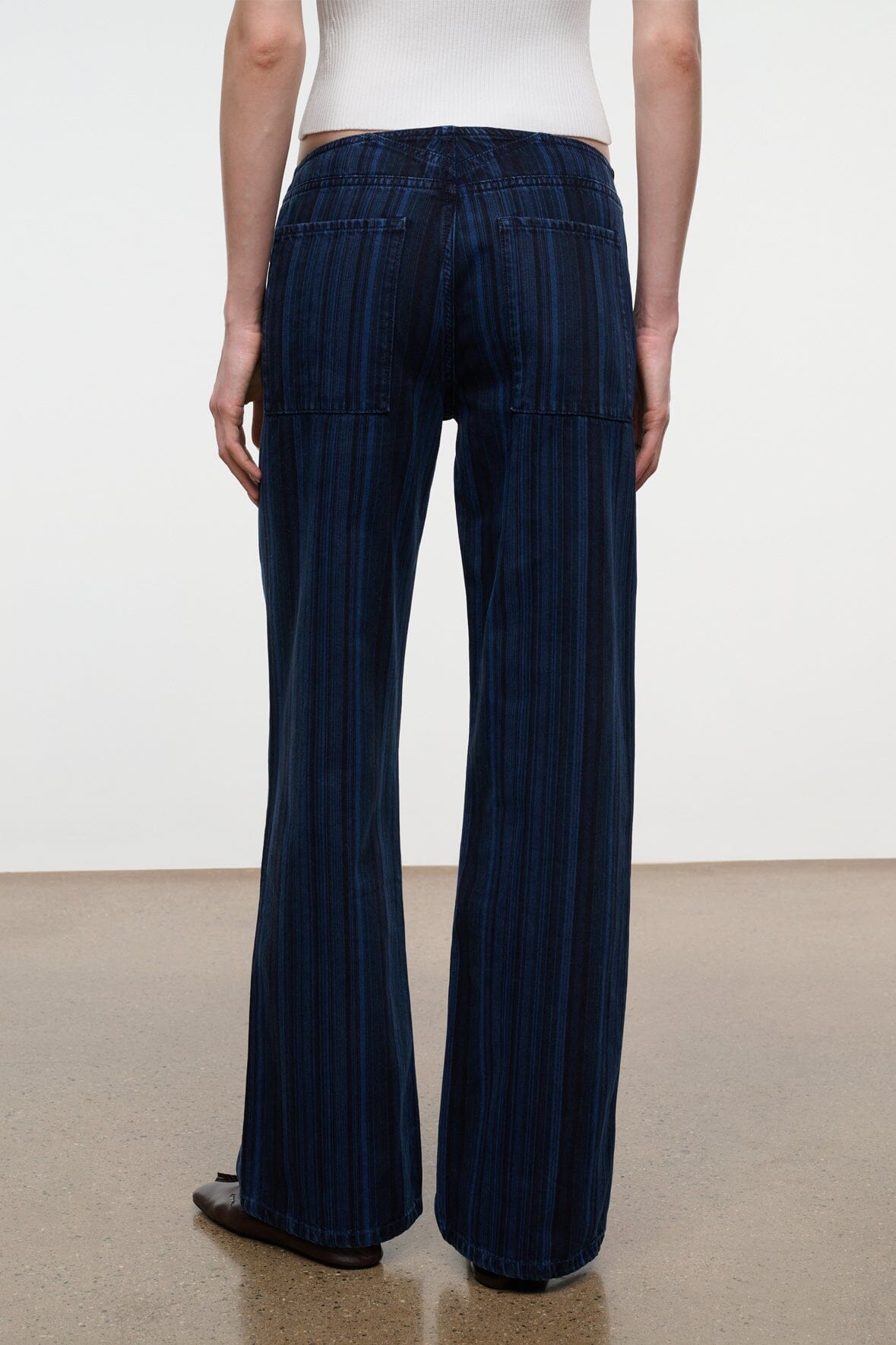 Women's dark navy striped wide-leg jeans with pull-on waistband and full-length straight legs