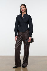 Black button-front top with stand collar, long sleeves, peplum waist detail