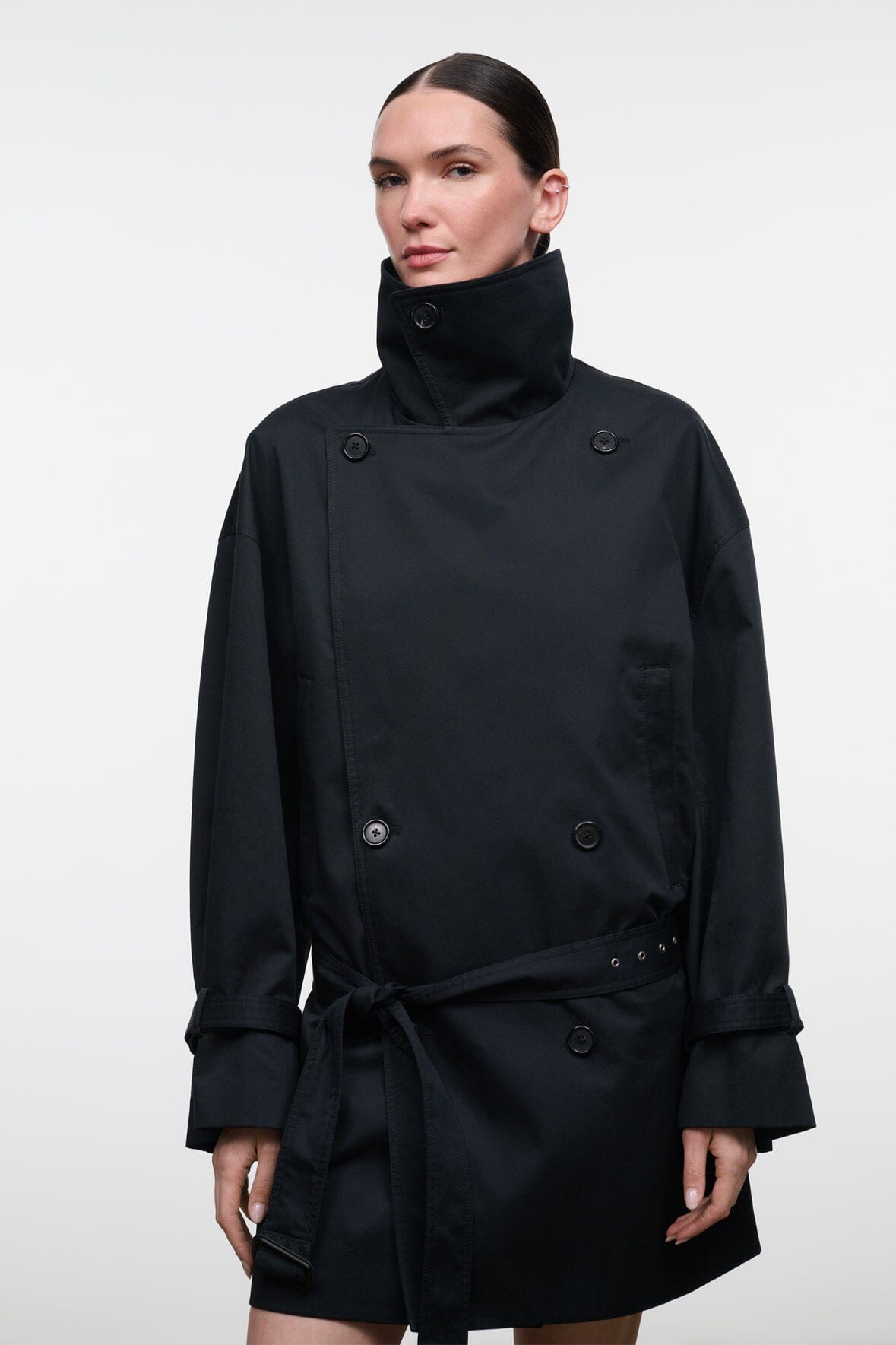 Black high-neck belted jacket with buttoned placket and shoulder epaulets