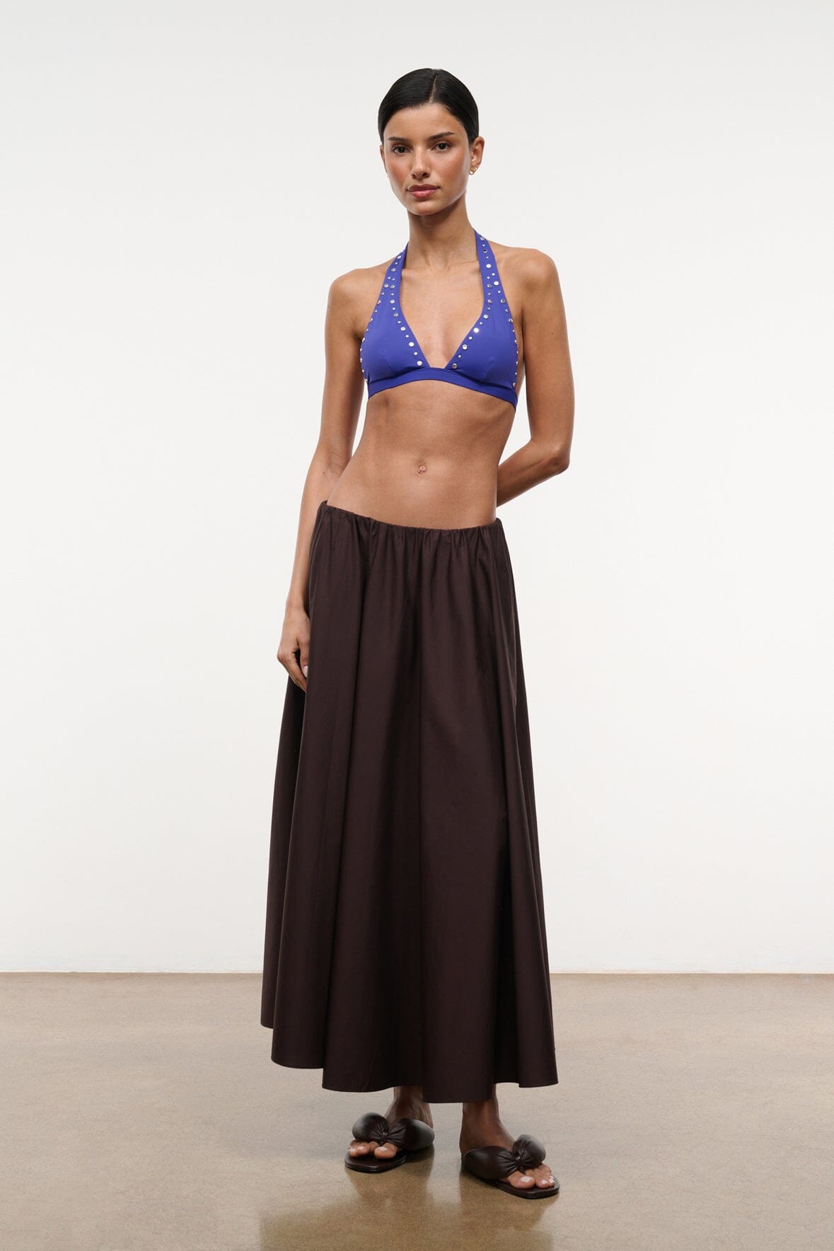 Dark brown maxi skirt with gathered waist and flowing A-line silhouette