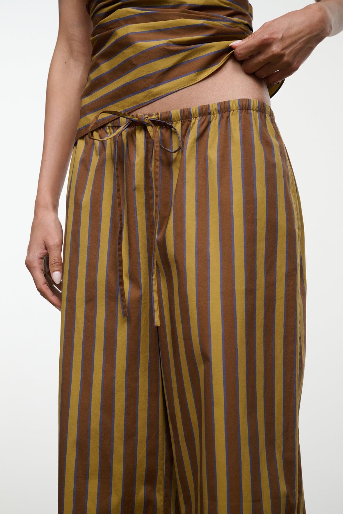 Striped wide-leg pants waistband with drawstring ties, vertical brown and teal stripes