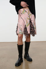 Silk skirt in dusty pink with multicolor botanical print and uneven layered hem