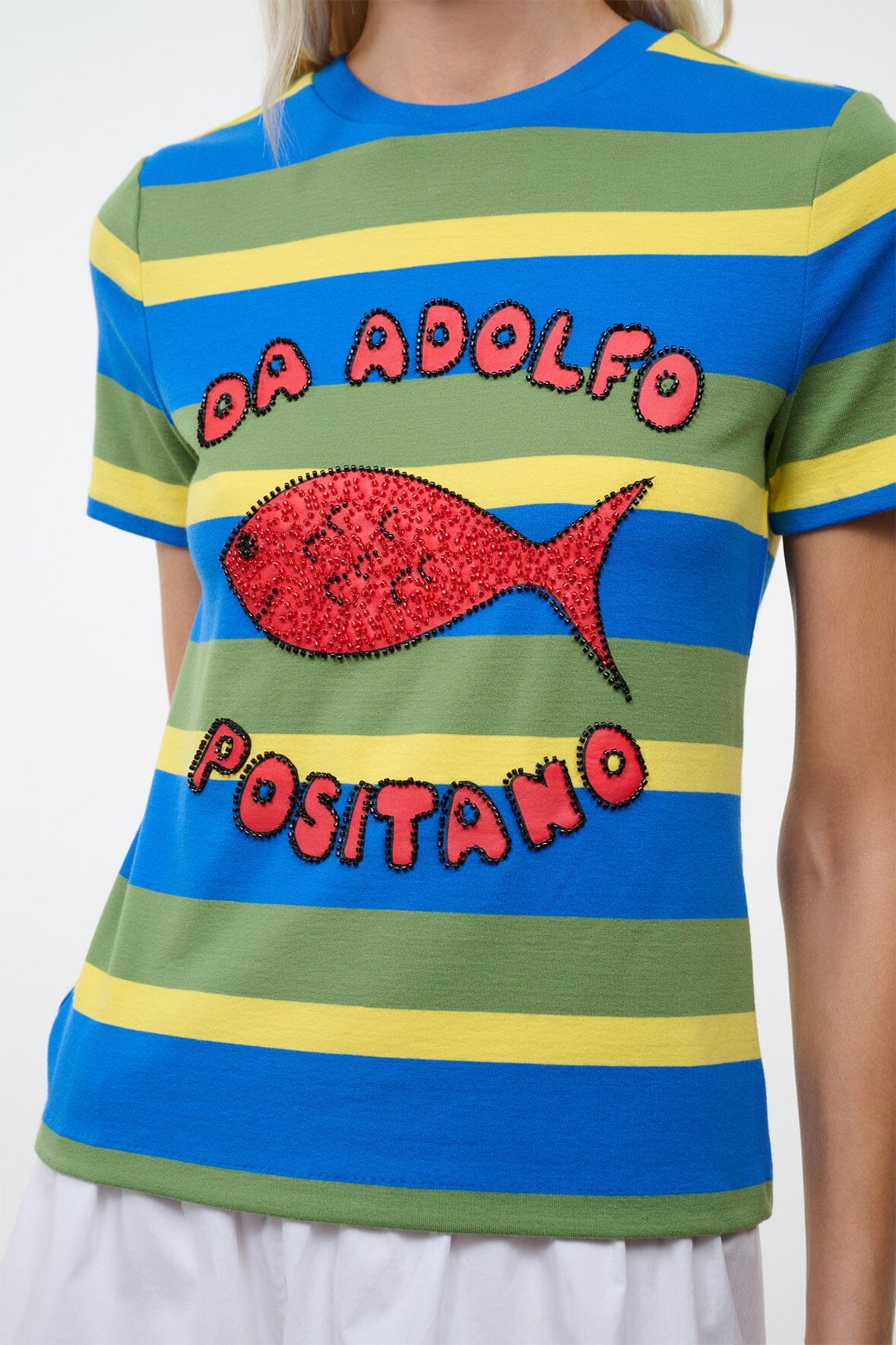 Close-up striped crew-neck tee with red fish graphic and 'Positano' text
