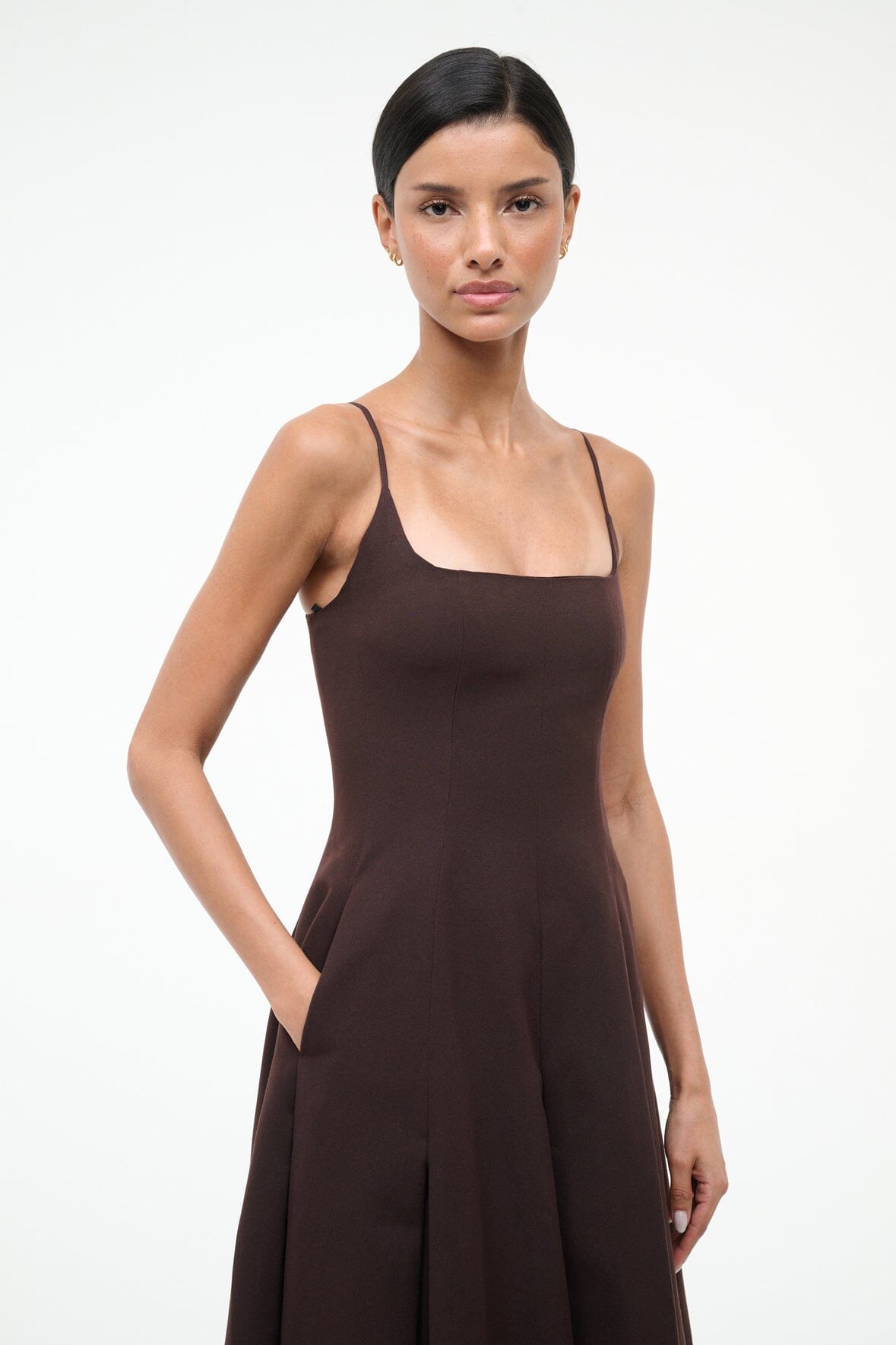 JOY maxi dress dark brown close-up: square neckline, thin straps, fitted pleated bodice