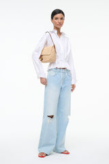 White PRIMROSE long-sleeve button-up shirt with pointed collar and open front