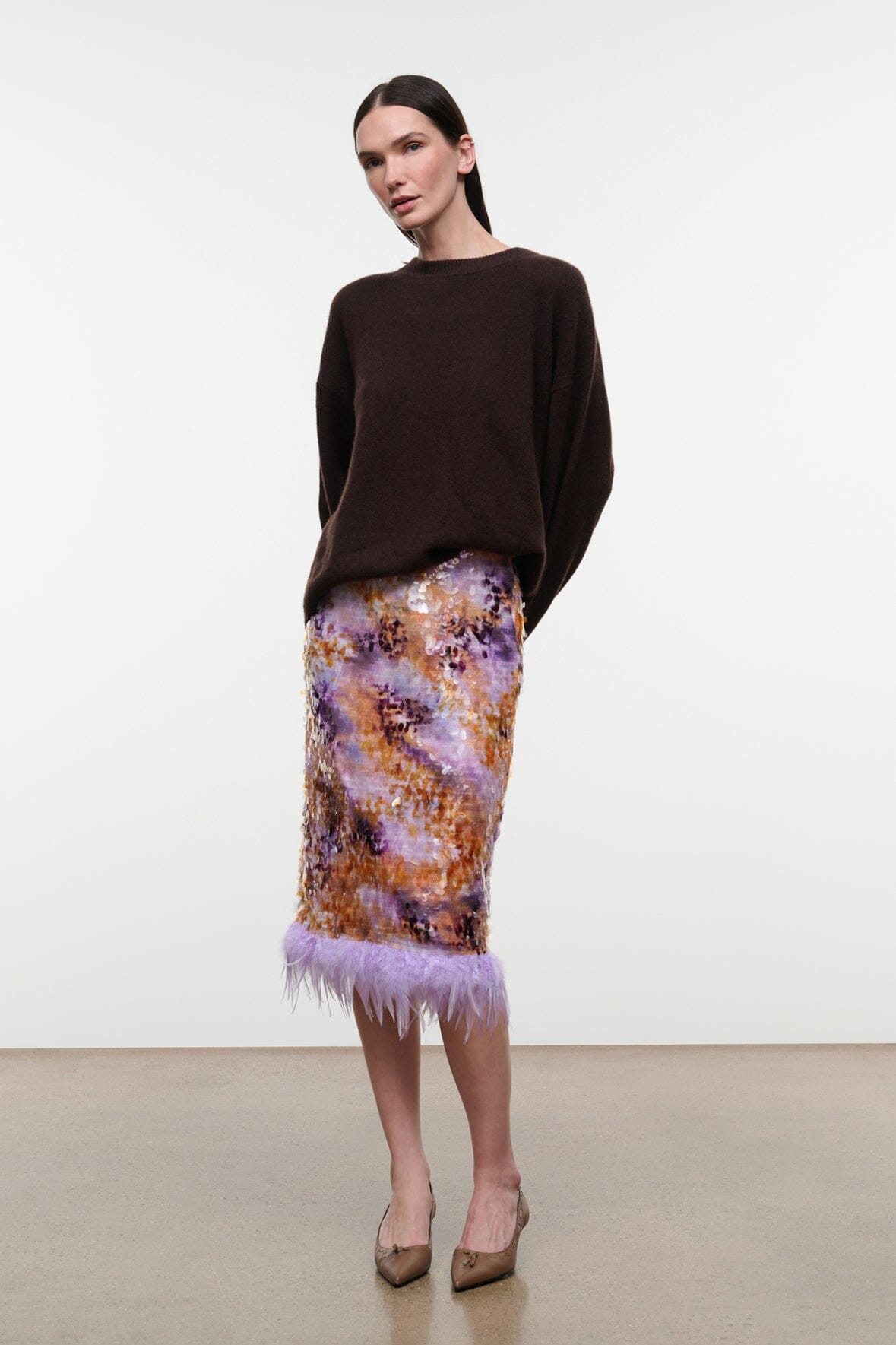 Galaxy print midi pencil skirt with lavender feathered hem, standing full view