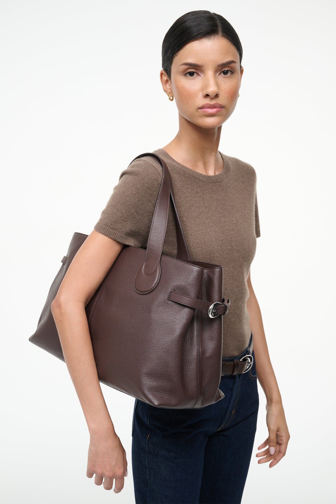 Espresso-brown large tote bag with shoulder straps and front buckle detail